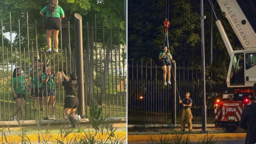 Joven es rescatada con grúa tras intentar ingresar ilegalmente al Fan Fest de Monterrey